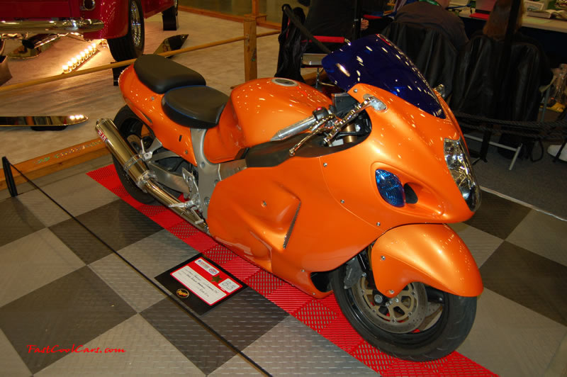 The 2009 World of Wheels Show in Chattanooga, Tennessee. On Jan. 9th,10, & 11th, Pictures by Ron Landry. There were lots of custom motorcycles there, this one is nice, love the color, orange.
