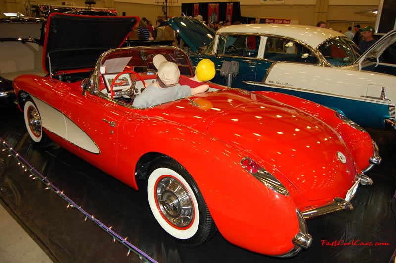 The 2009 World of Wheels Show in Chattanooga, Tennessee. On Jan. 9th,10, & 11th, Pictures by Ron Landry. Great example of a orange and white Chevrolet Corvette.