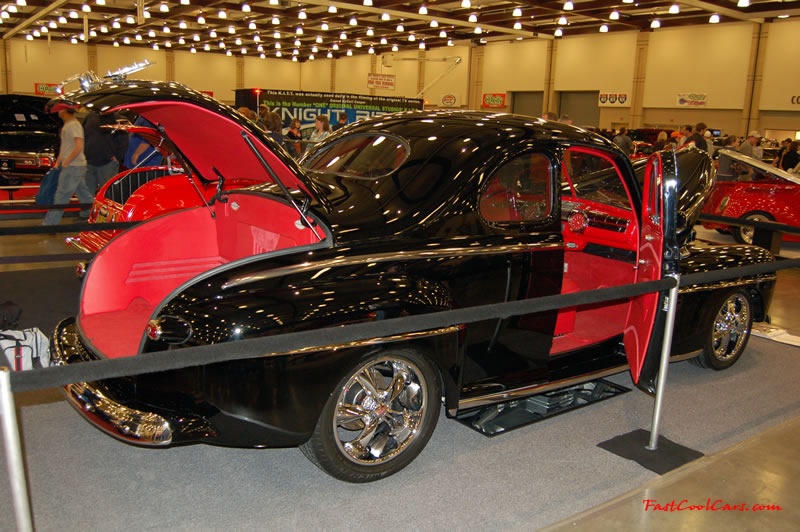 The 2009 World of Wheels Show in Chattanooga, Tennessee. On Jan. 9th,10, & 11th, Pictures by Ron Landry. Custom Hot rod, nice red interior and accents on this sharp looking black ride.