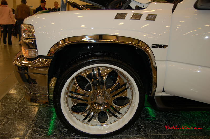 The 2009 World of Wheels Show in Chattanooga, Tennessee. On Jan. 9th,10, & 11th, Pictures by Ron Landry. Sitting on the custom 26 inch wheels. These rims are custom painted to match the vehicles paint job.