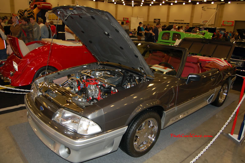 The 2009 World of Wheels Show in Chattanooga, Tennessee. On Jan. 9th,10, & 11th, Pictures by Ron Landry. Two tone convertible Ford Mustang, with Chrome Pony wheels too.