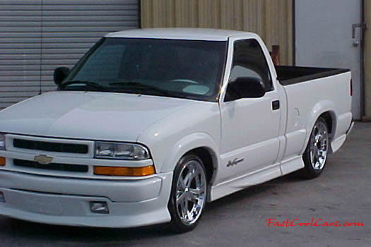 1999 Chevrolet Extreme pick-up with 18' chrome Ultrasnice factory ground effects package.