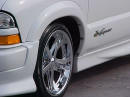 1999 Chevrolet Extreme pick-up with 18' chrome Ultras, and wide tires.