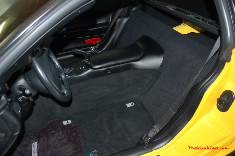 2002 Millennium Yellow supercharged & methanol injected Z06 Corvette, with many modifications, over 50 grand invested in the past 2+ years, for sale $38,000 what a deal. Cleaning under the seats and installing the hardbar.