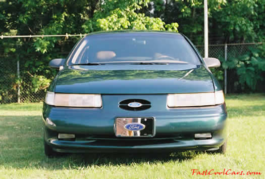 1993 Ford Taurus SHO - Front view, nice chrome front license Ford plate - factory ground effects - fastcoolcars.com