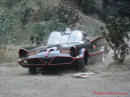 The Original Batmobile from the series in 1966-68 TV series, coming out of the bat cave area.