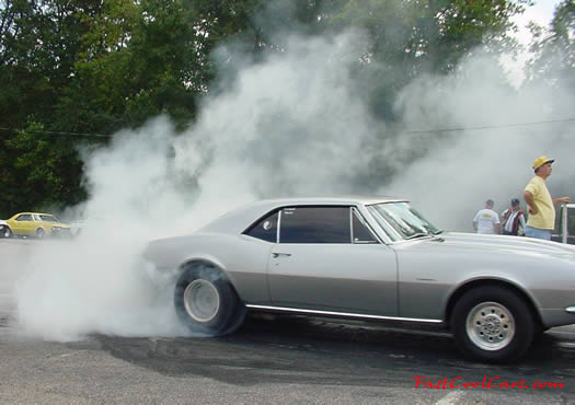 Older Chevy Camaro burnout