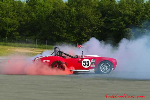 The new Kumho red smoking tires, made especially for drifting. Kumho Ecsta MX-C tires. Great for Fast Cool Cars for sure. Does great on this AC Cobra.