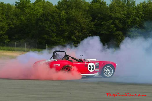 The new Kumho red smoking tires, made especially for drifting. Kumho Ecsta MX-C tires. Great for Fast Cool Cars for sure. Does great on this AC Cobra.