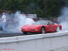 C5 Chevrolet Z06 Corvette 2001 - 2004, 385 to 405 horsepower, Aluminum block and heads LS6, all with 6 speeds.  America's sport car in Red, at the track, doing a huge burnout.