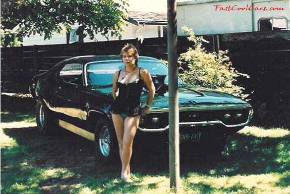 1971 Plymouth GTX 440 engine and beautiful young lady too.