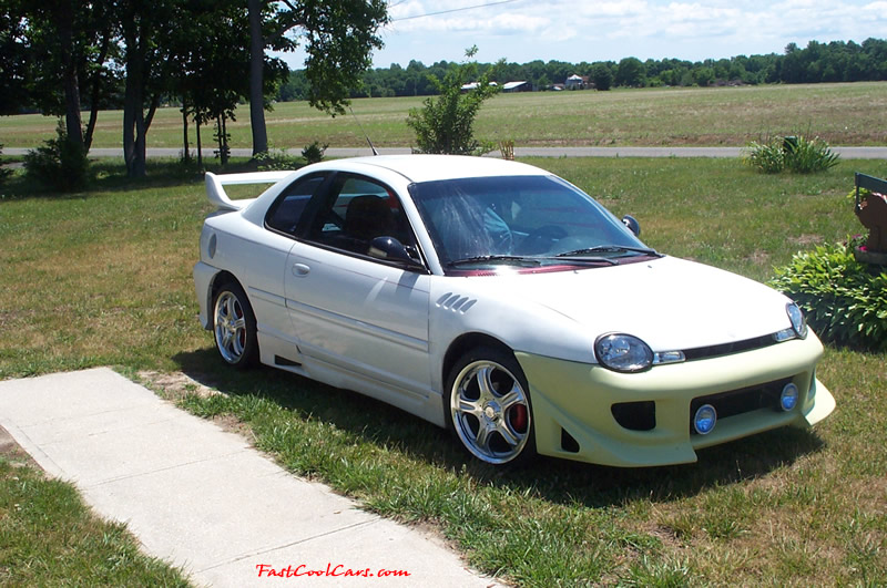 1998 Dodge Neon - White, and has way to many mods to list.
