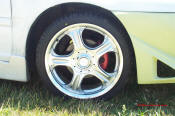 1998 Plymouth Neon - nice new custom 17" wheels, very sweet, and shinny.