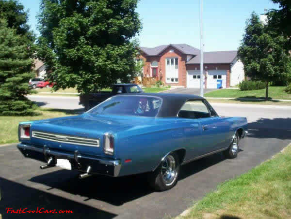 1969 Plymouth Satellite Mod top car. As you can see, it is a beauty. It sits in 4 chrome Magnum 500 wheels mounted on BF Goodrich TA's.