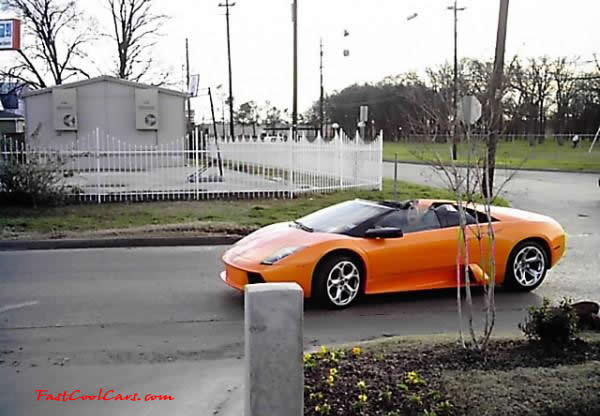 Very Fast Cool Exotic Supercar, roadster in orange