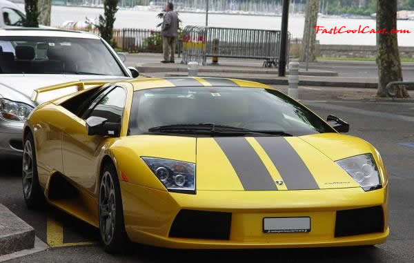 Very Fast Cool Exotic Supercar, not to sure about the black racing stipes on the Lambo