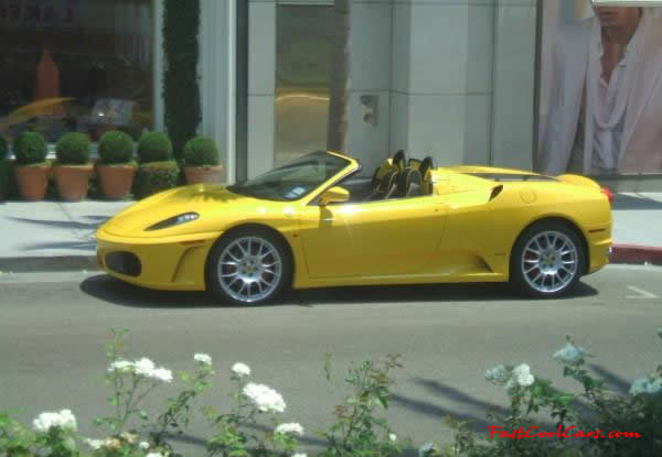 Very Fast Cool Exotic Supercar, and in a Yellow roadster too. WooHoo