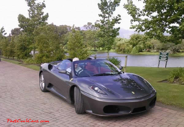 Very Fast Cool Exotic Supercar, titanium colored Ferrari