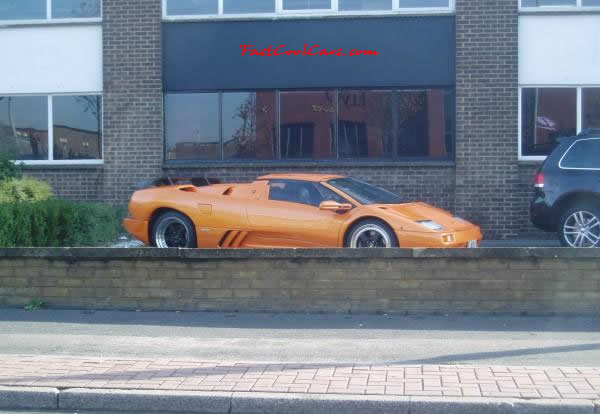 Very Fast Cool Exotic Supercar, nice orange paint job.