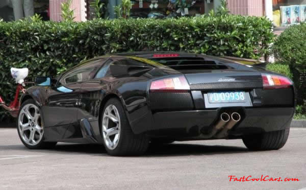 Very Fast Cool Exotic Supercar, slick black Lamborghini.