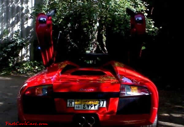 Very Fast Cool Exotic Supercar, red and lambo doors.