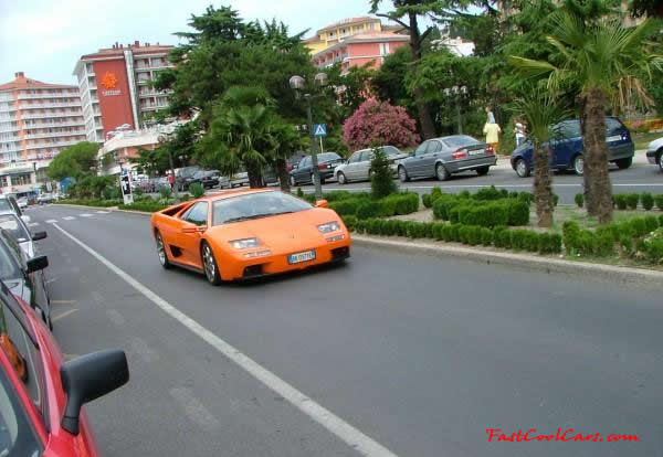 Very Fast Cool Exotic Supercar, orange paint and sports car seem to go together well.