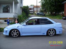 1994 Ford Escort with Honda body kit Corvette tail lights, and more.