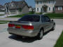 1993 Gold Honda Accord SE rear view, check out the cool stock 'SE' spoiler.