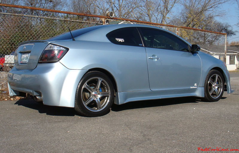 2005 Scion tC Azure Pearl with a TRD muffler, custom interior, blue led lights inside cabin area, changing color LED's, 17" ICW racing wheels