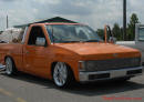Lowriders that have been lowered, dropped, slammed, and scraping. Low rider truck.