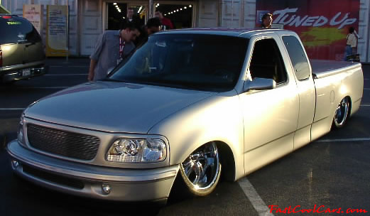 Lowriders that have been lowered, dropped, slammed, and scraping. Sweet pick-up truck.