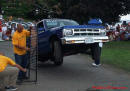Lowriders that have been lowered, dropped, slammed, and scraping. Hydraulic bouncing height contest.