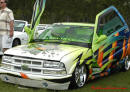 Lowriders that have been lowered, dropped, slammed, and scraping. Check out the doors, cool.