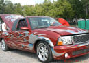 Lowriders that have been lowered, dropped, slammed, and scraping. Nice flame job.