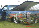 Lowriders that have been lowered, dropped, slammed, and scraping. Killer truck, check out the graphics.