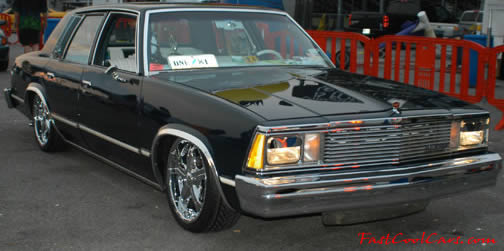 Lowriders that have been lowered, dropped, slammed, and scraping. American classic.