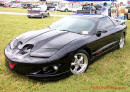 Lowriders that have been lowered, dropped, slammed, and scraping. Pontiac Ram Air Trans Am.