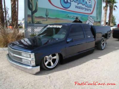 Lowrider pick-up that has been lowered, dropped, slammed, and scraping, using many different modifications.