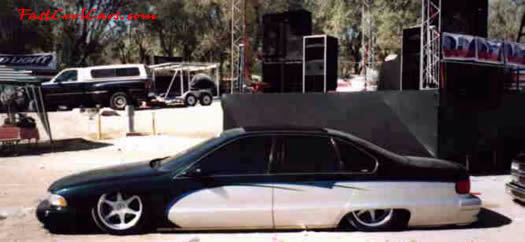 Lowriders that have been lowered, dropped, slammed, and scraping. Classice Chevrolet Caprice very lowrider.
