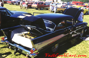 Lowriders that have been lowered, dropped, slammed, and scraping. Classic American Lowrider.
