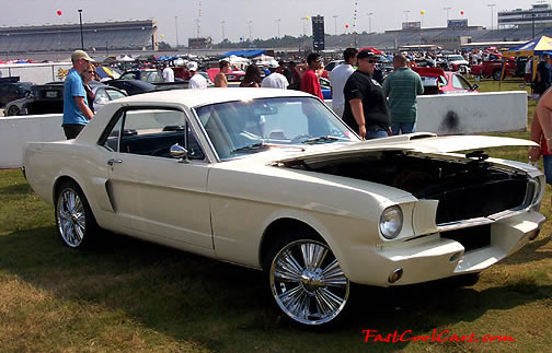 Lowriders that have been lowered, dropped, slammed, and scraping. Lowrider Classic Ford Mustang.