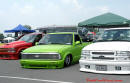 Lowriders that have been lowered, dropped, slammed, and scraping. On the ground lowrider trucks.