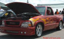 Lowriders that have been lowered, dropped, slammed, and scraping. nice flame paint job.