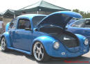 Lowriders that have been lowered, dropped, slammed, and scraping. Low rider VW Bug.