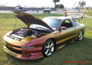 Lowriders that have been lowered, dropped, slammed, and scraping. Low rider Ford Probe.
