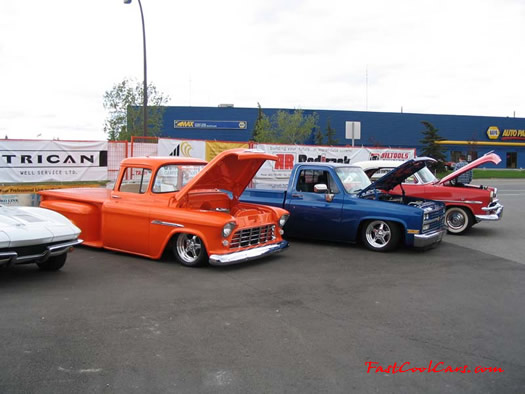 Lowriders that have been lowered, dropped, slammed, and scraping. Classic American low rider trucks.