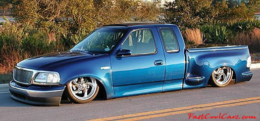 Lowriders that have been lowered, dropped, slammed, and scraping.