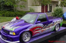 Lowriders that have been lowered, dropped, slammed, and scraping. Great paint job.