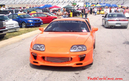 Lowriders that have been lowered, dropped, slammed, and scraping. Toyota Supra low rider.