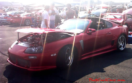 Lowriders that have been lowered, dropped, slammed, and scraping. Toyota Supra low rider.